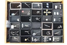 Costume Jewellery - a display case containing sterling silver necklaces, pendants,