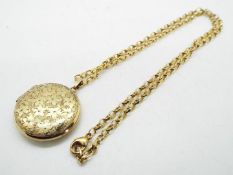 A 9 carat gold locket, Birmingham hallmark and a 9 carat gold chain stamped 9K,