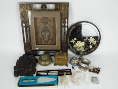 Lot to include South American style wall art, Oriental style clock, trinket box, cigarette lighters,