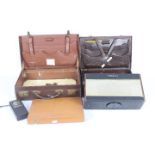 Two vintage brief cases, a Roberts radio