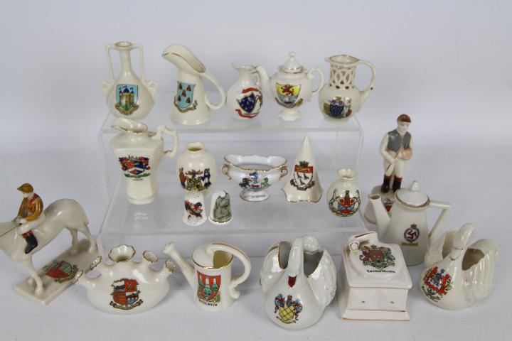 A collection of crested ware to include