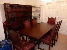 An extending dining table with four dini