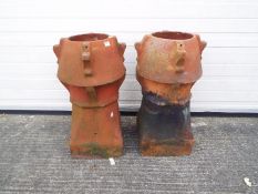 A pair of chimney pots measuring approxi