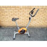 A Body Fit exercise bike, 114 cm (h)