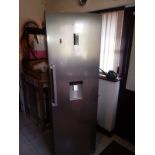 A grey Kenwood refrigerator with water d