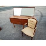 A mirror topped dressing table and chair, approximately 123 cm x 150 cm x 42 cm.