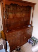 A kitchen dresser with three short drawers over two cupboards, approximately 200 cm x 15 cm x 48 cm.