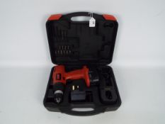 A cased Powerbase Xtreme electric drill