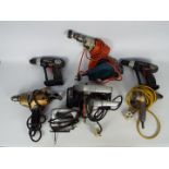 A mixed power tool lot to included drills, a planer. a circular saw and similar.