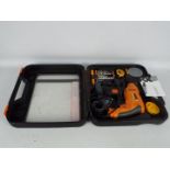 A worx drill kit in box with tape drill bits and drill handle.