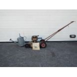 A gardening lot to include a lawn boy 1958 model 7150 21 inch lawn mower with manual and a