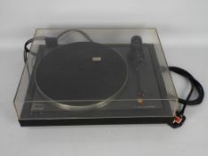 A Linn Axis turntable with Linn Basik Plus tone arm.