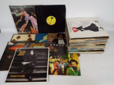 12" vinyl record collection to include R