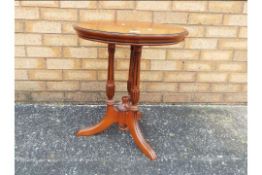 An occasional table measuring approximately 68 cm x 50 cm.