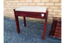 A hinge top piano stool, 51 cm (h) and a table top jewellery box 36 cm x 38 cm x 18 cm.