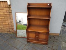 Ercol - A Waterfall bookcase with lower