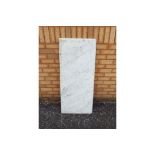 A white, veined marble counter top, approximately 117 cm x 51 cm x 2.2 cm.