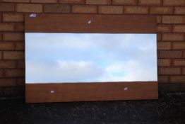 A vintage wall mirror, approximately 70 cm x 110 cm.