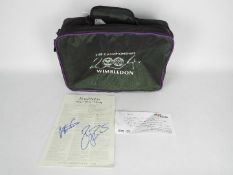 Tennis - A Wimbledon Championship 2004 bag and a Wimbledon 2004 Order Of Play programme signed by
