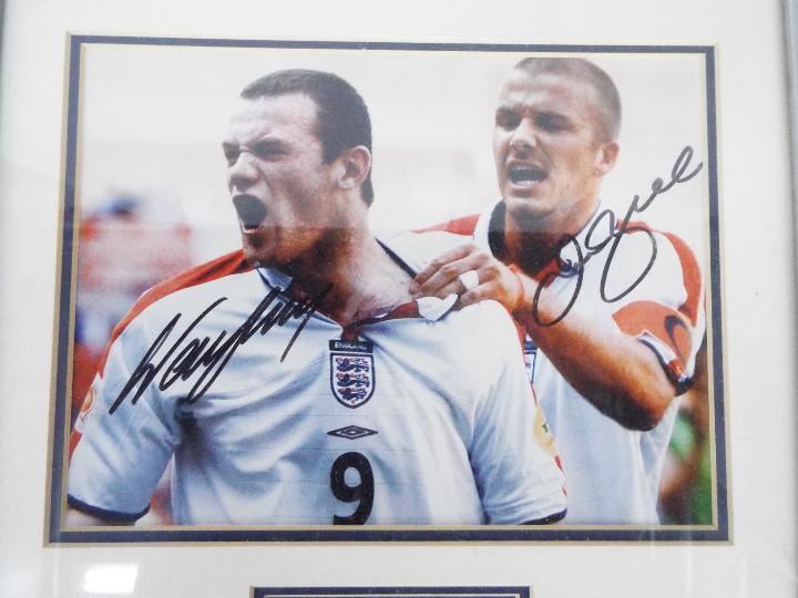 A signed photograph of Wayne Rooney and David Beckham, mounted and framed in glazed display, - Image 2 of 7