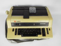 A vintage Olympia International electric typewriter.