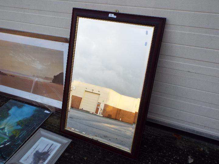 A wood framed bevel edge wall mirror, approximately 100 cm x 66 cm and three prints of varying size. - Image 4 of 4