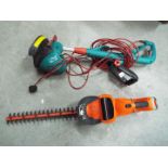 A Bosch Combitrim and a Black & Decker hedge trimmer and similar.