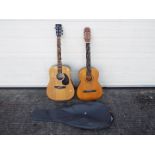 Two acoustic guitars comprising an Encore W255 and a BM, one contained in carry case.