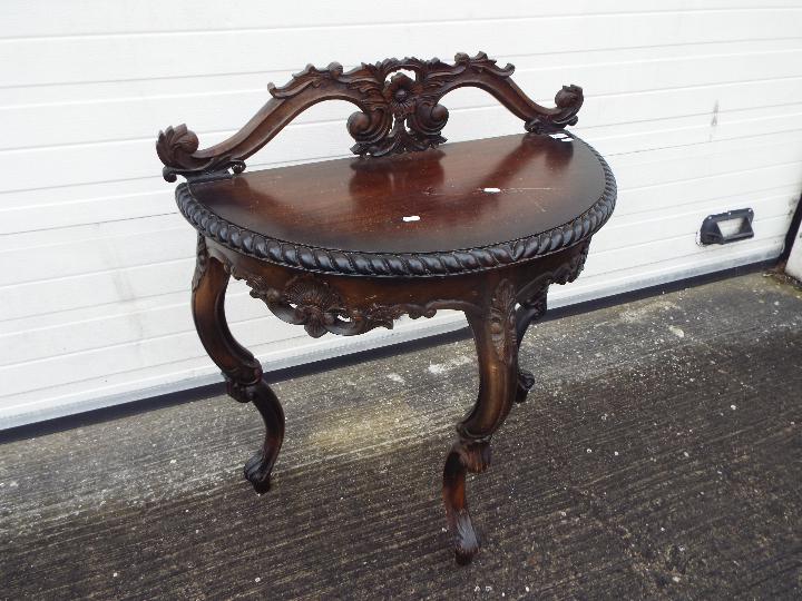 A demi lune console table with carved decoration on tripod supports, - Image 3 of 3