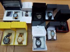 Nine cased designer watches - a job lot