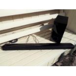 An LG soundbar # NB2540 and subwoofer # S24A1-W with remote