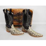 Herencia boots - a pair of leather cowbo