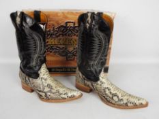 Herencia boots - a pair of leather cowbo