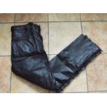 A pairs of Biker's black leather trouser