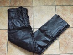 A pairs of Biker's black leather trouser