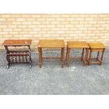 A nest of three occasional tables, largest approximately 48 cm x 51 cm x 35 cm and a magazine rack.