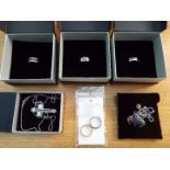 Jewellery - unused surplus retail stock - three white metal rings by 'Exclusively His', cased,