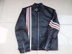 A Real Leather motorcycle jacket, black with US Stars and Stripes flag to the back,