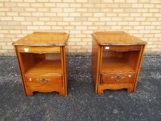 A pair of bedside cabinets measuring approximately 60 cm x 49 cm x 46 cm.