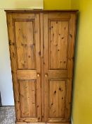 A pine twin door wardrobe measuring approximately 190 cm x 90 cm x 58 cm (dismantled for