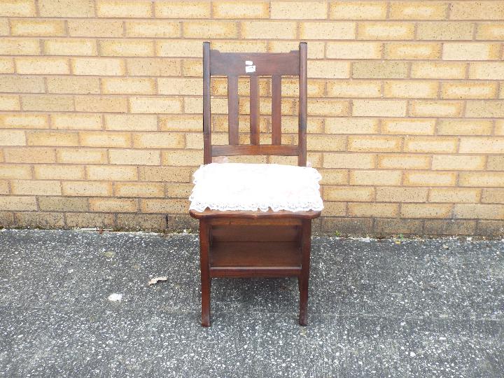 A 20th century metamorphic library chair. - Image 2 of 2