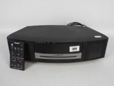 A Bose Wave music system AWRCC5 with rem