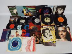 7" vinyl record collection to include Blondie, The Pretenders, George Michael, Status Quo,