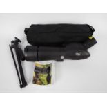 An Optus Zoom 20-60 x 60 spotting scope with table tripod and carry case.