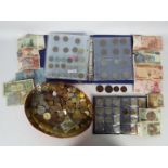 A collection of UK and foreign coins and banknotes,