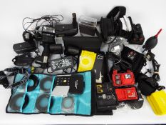 Photography - Various accessories to include battery packs, flash and similar.