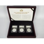 The Complete Peace Dollar Mintmark Collection set by CPM comprising three encapsulated Peace