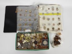 A collection of coins, UK and foreign, Georgian and later, some silver content.