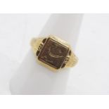 A 9ct gold signet ring, size Q, approximately 4.6 grams.