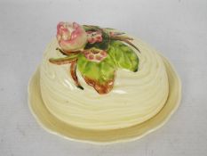 Clarice Cliff for Newport Pottery, a butter dish decorated in the Water Lily pattern,